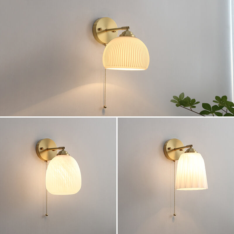 Moderne Wandlampe aus Glas und Messing im winterlichen Stil