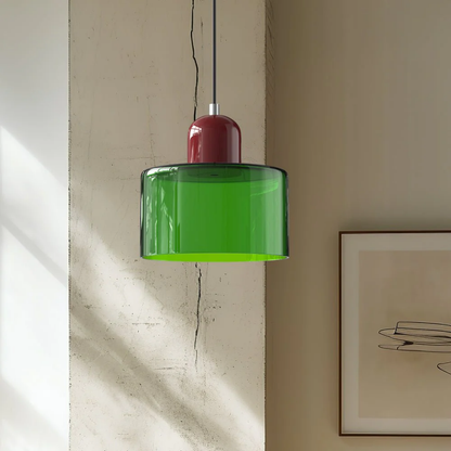 Stilvolle Retro-Hängelampe mit orangefarbenem Glasschirm und grüner Krone