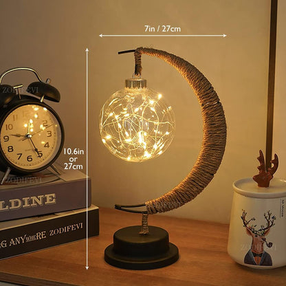 Elegante stimmungsvolle LED-Tischlampe aus Glas in Mondform mit warmem Licht