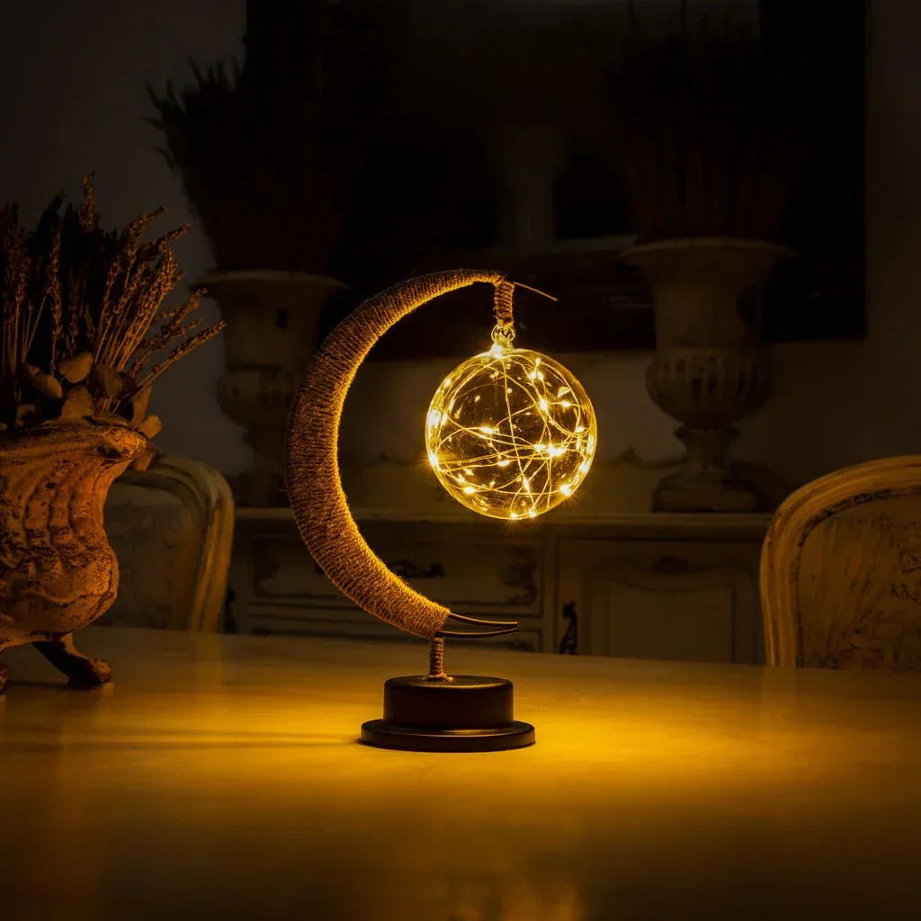 Elegante stimmungsvolle LED-Tischlampe aus Glas in Mondform mit warmem Licht