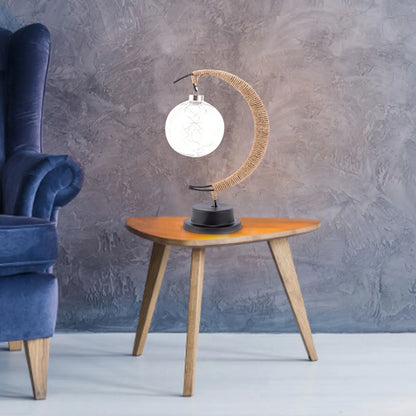 Elegante stimmungsvolle LED-Tischlampe aus Glas in Mondform mit warmem Licht