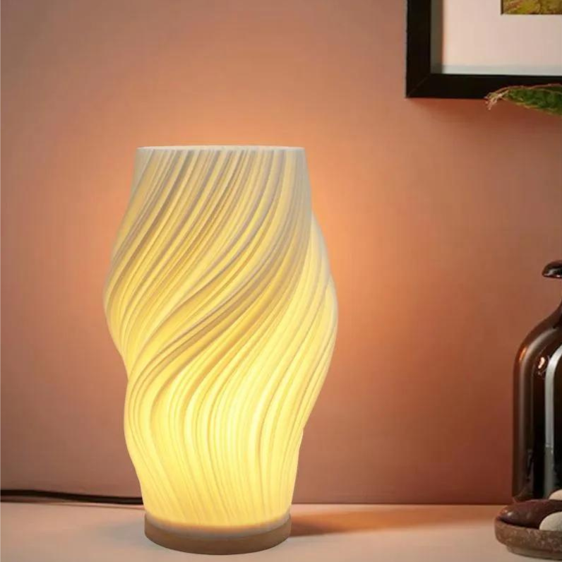 Gemütliche LED-Tischlampe mit Dimmfunktion und stilvollem Wellenmuster