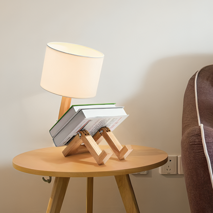 Elegante skandinavische Tischlampe mit Bücherregal