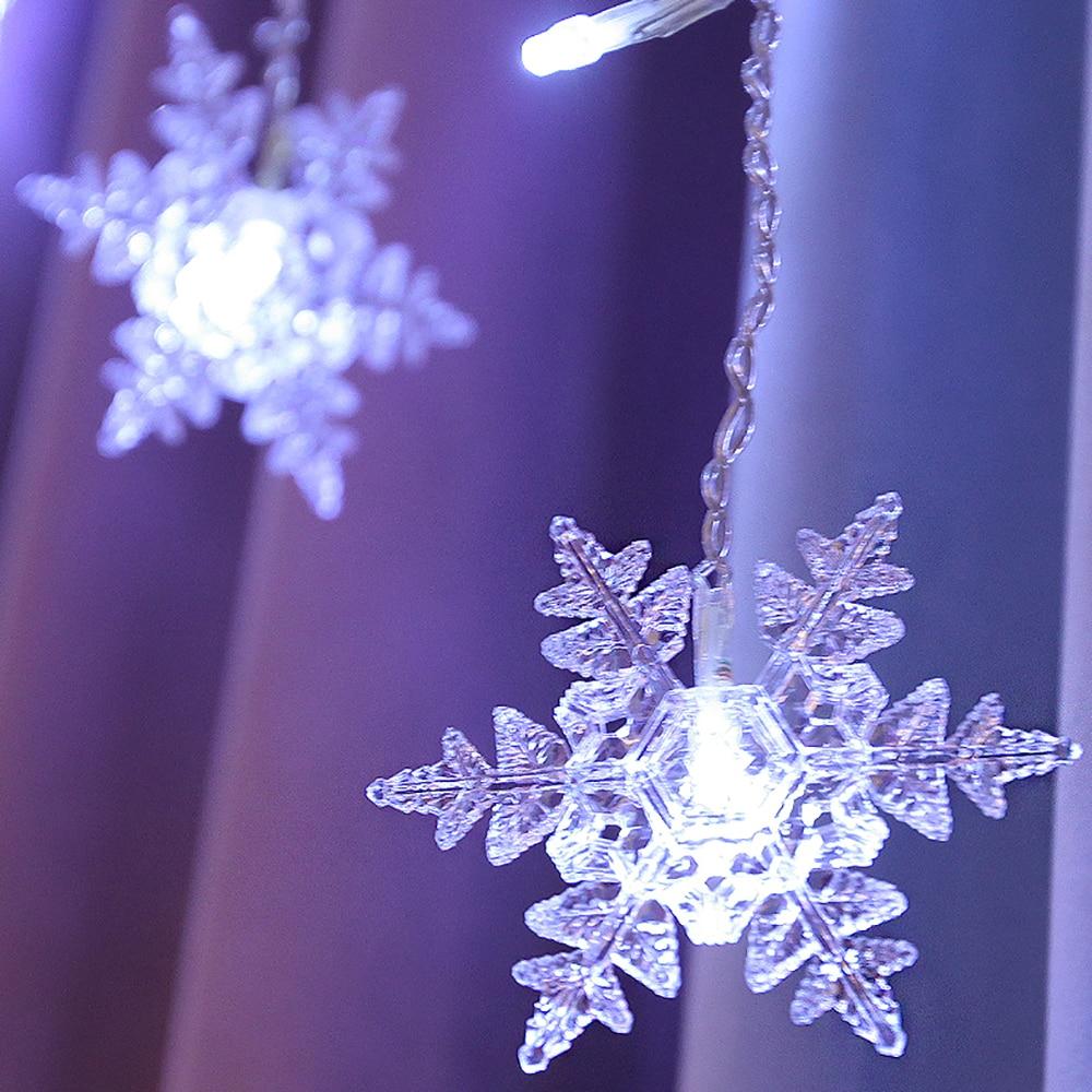 Schneeflocken-Lichterkette – Warme Winteratmosphäre