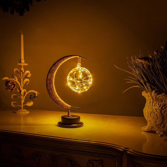 Elegante stimmungsvolle LED-Tischlampe aus Glas in Mondform mit warmem Licht
